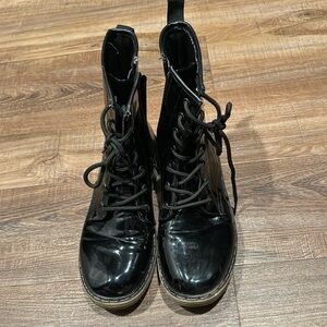 Black combat boots women’s size 9 NWOT.